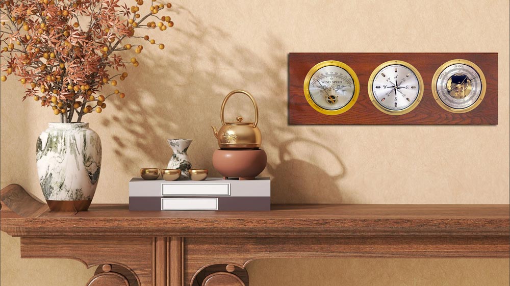 an interior wall with fall colors flowers in a vase and a cape cod wind and weather instrument panel<br />
